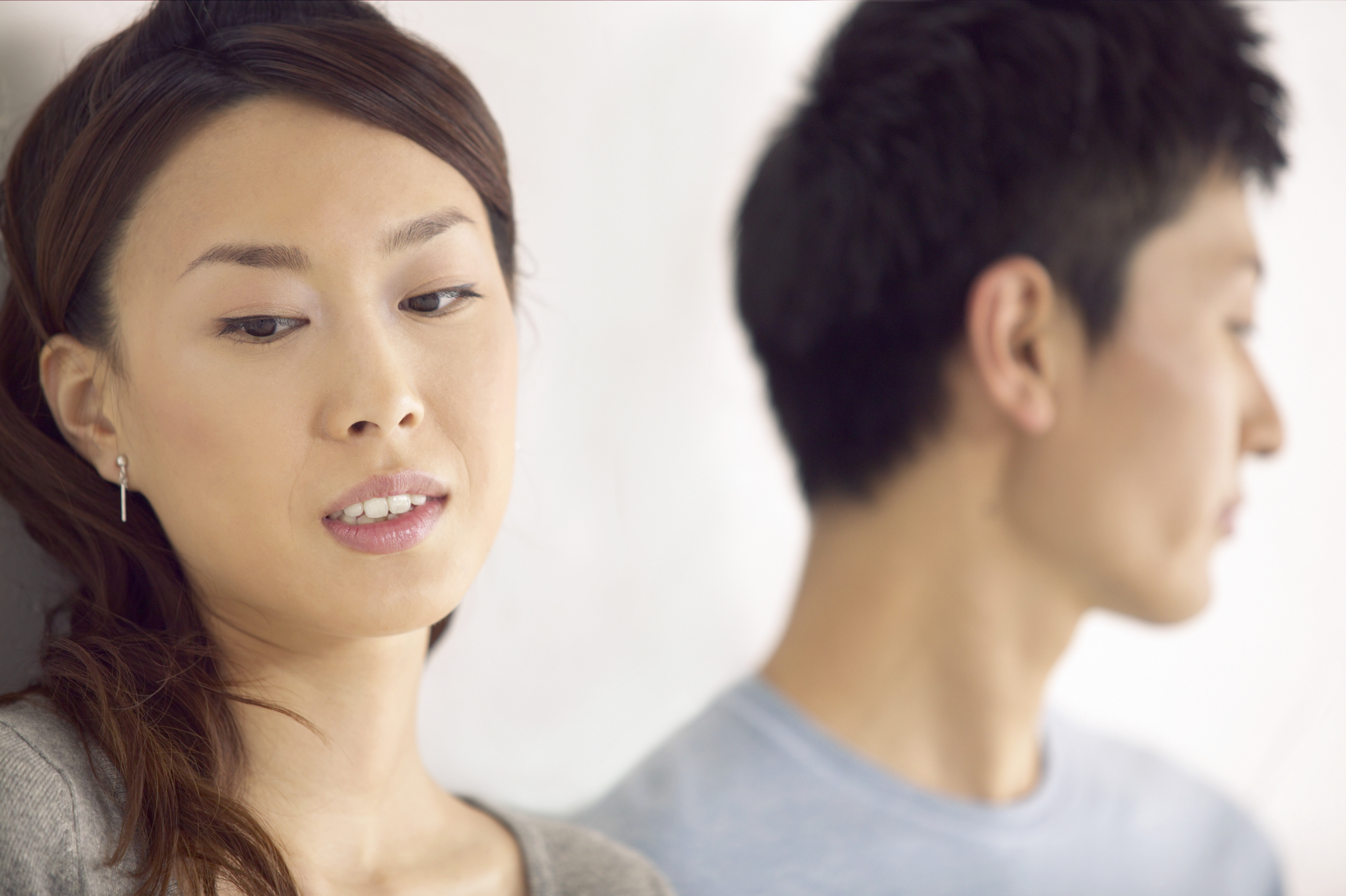 Image of Asian Couple looking away | Affair Recovery Counseling Ohio| Reconnecting Columbus