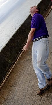 Image of man pulling rope | In-Laws and your marriage | Reconnecting Columbus | Ohio