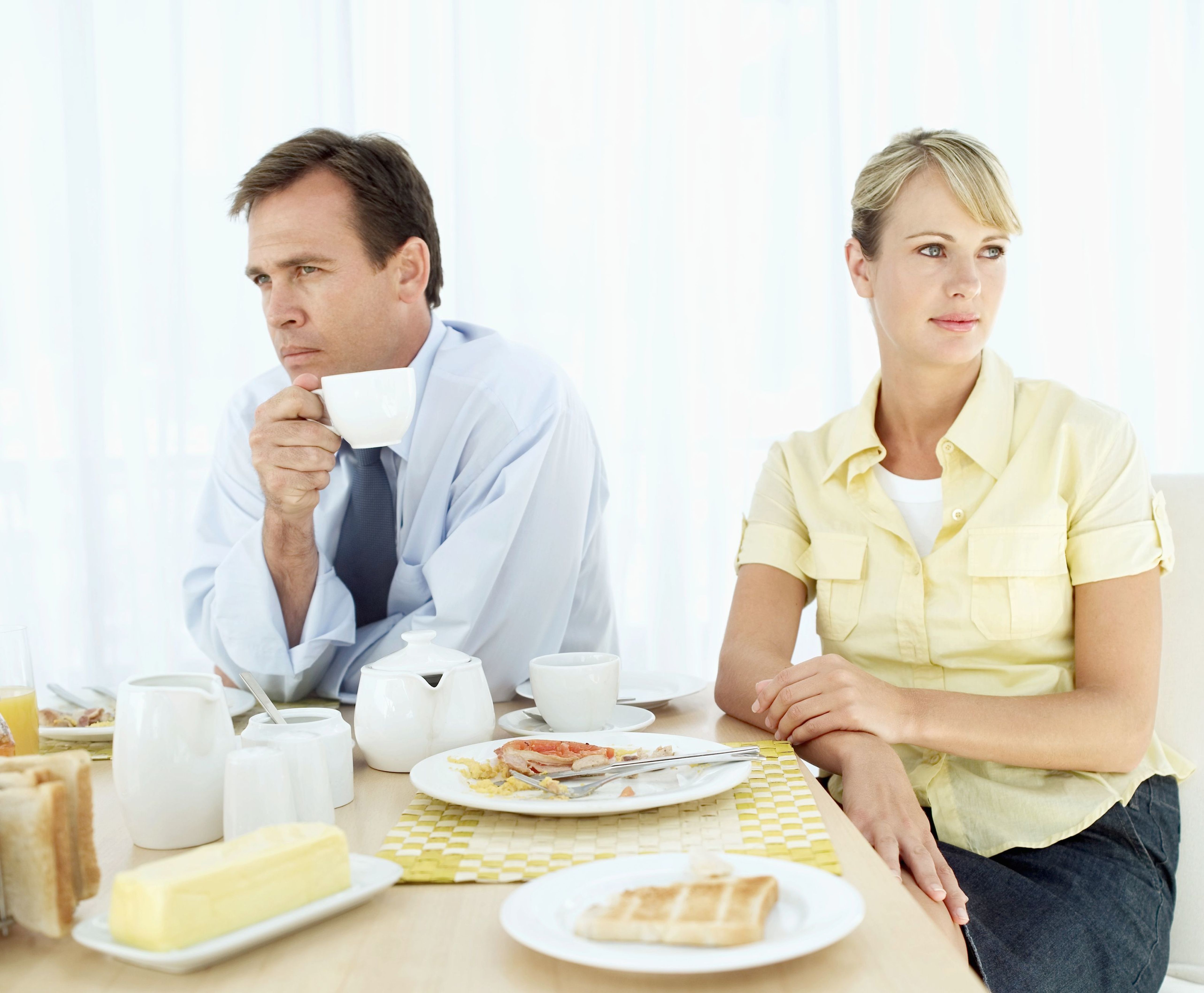 Image of distant couple at breakfast | Marriage Counseling | Ohio